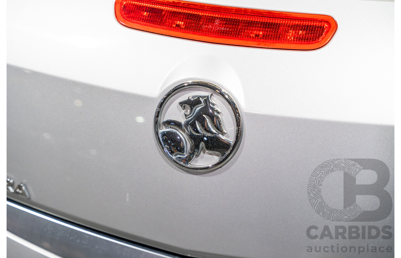 1/2006 Holden Tigra  XC MY06 2d Convertible Metallic Silver 1.8L