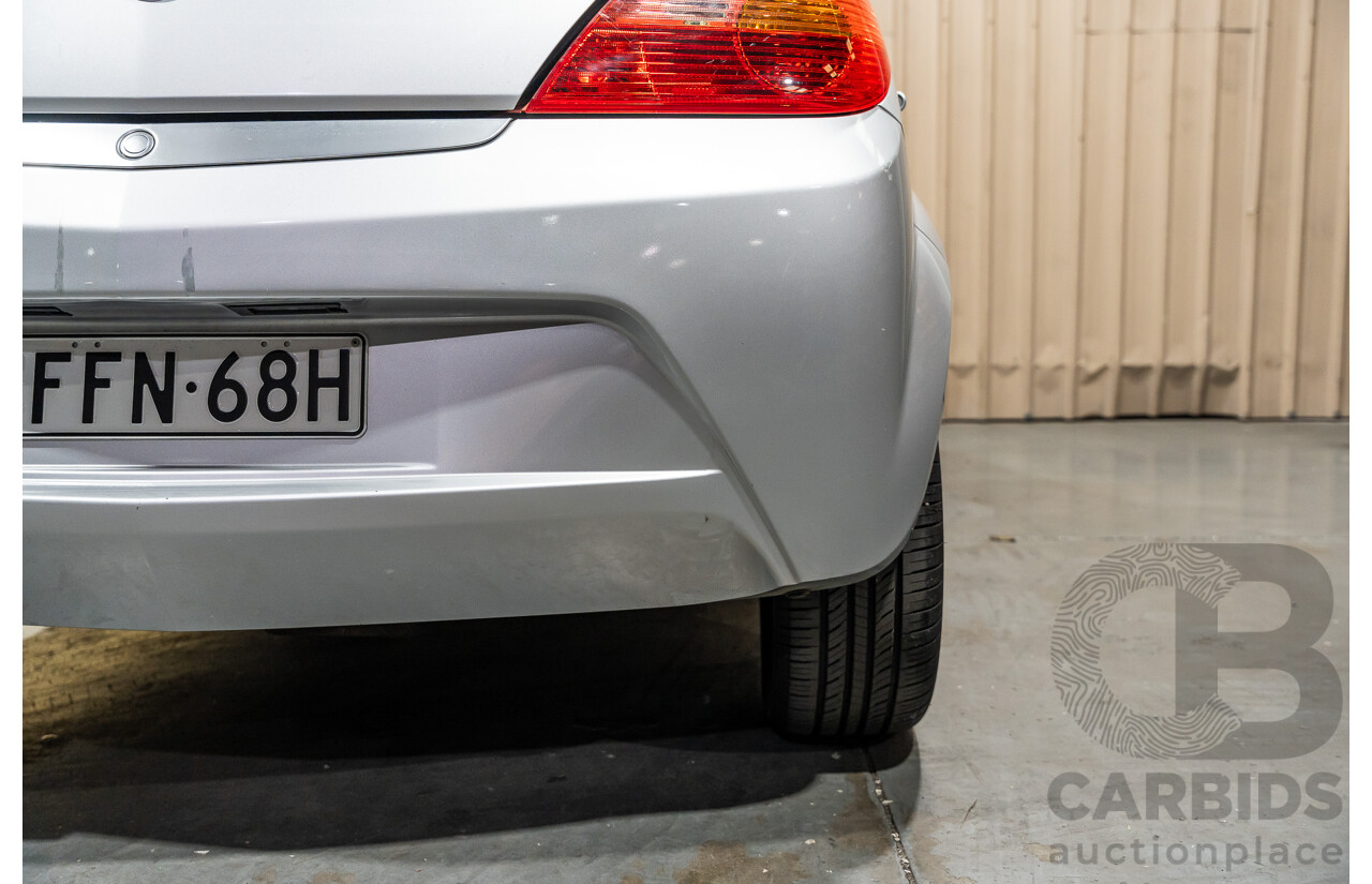 1/2006 Holden Tigra  XC MY06 2d Convertible Metallic Silver 1.8L