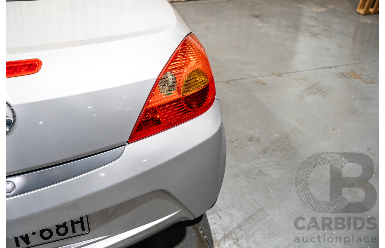 1/2006 Holden Tigra  XC MY06 2d Convertible Metallic Silver 1.8L