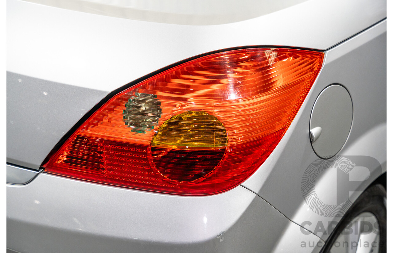 1/2006 Holden Tigra  XC MY06 2d Convertible Metallic Silver 1.8L