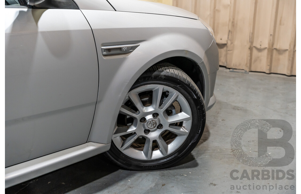 1/2006 Holden Tigra  XC MY06 2d Convertible Metallic Silver 1.8L