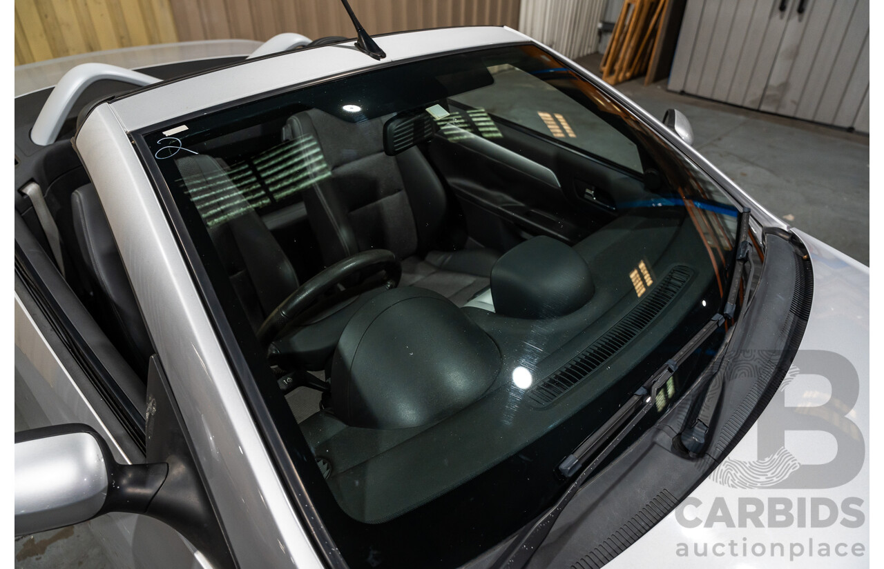 1/2006 Holden Tigra  XC MY06 2d Convertible Metallic Silver 1.8L