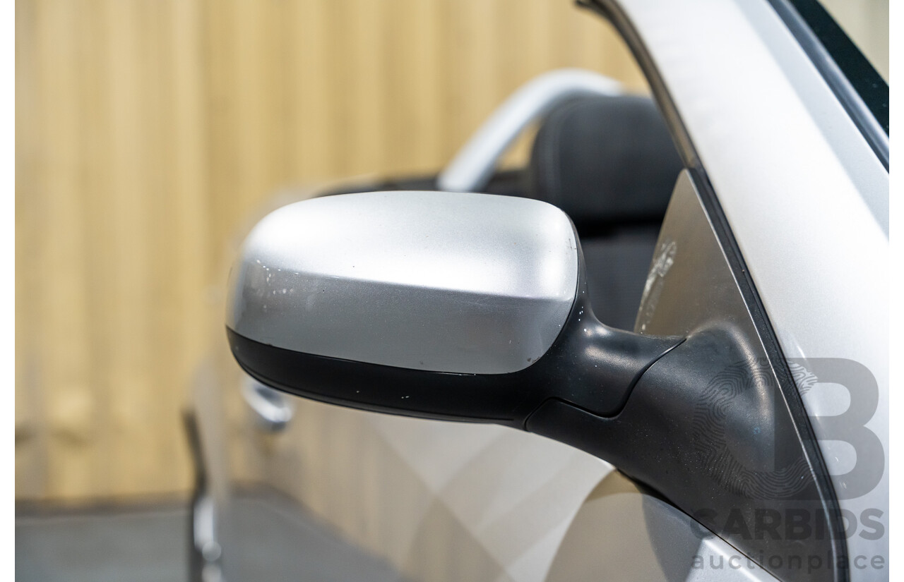 1/2006 Holden Tigra  XC MY06 2d Convertible Metallic Silver 1.8L