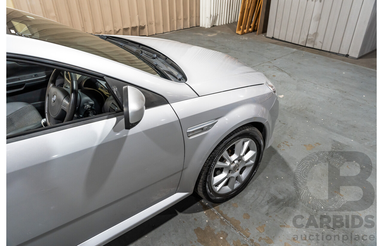 1/2006 Holden Tigra  XC MY06 2d Convertible Metallic Silver 1.8L