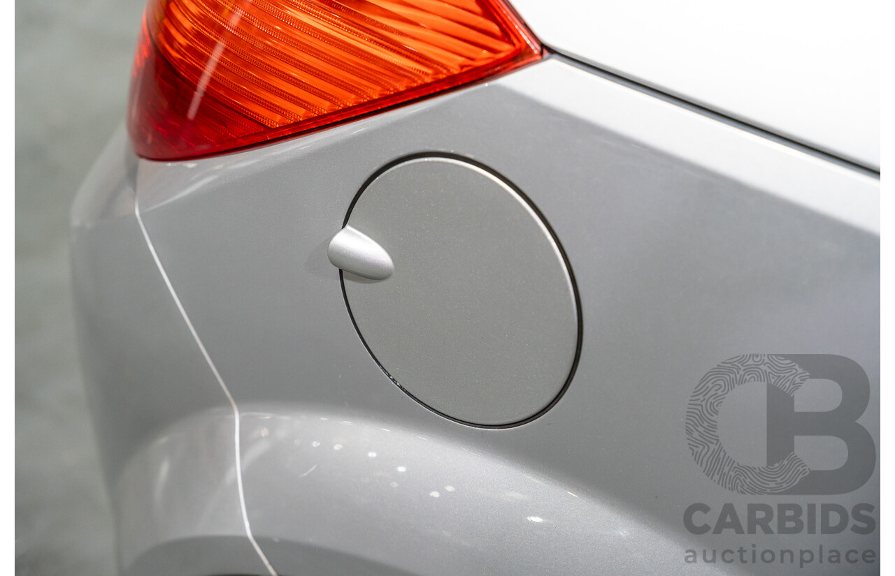 1/2006 Holden Tigra  XC MY06 2d Convertible Metallic Silver 1.8L