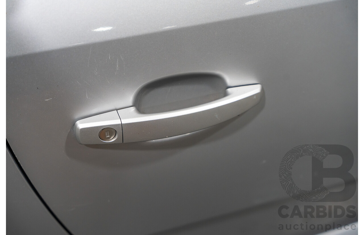 1/2006 Holden Tigra  XC MY06 2d Convertible Metallic Silver 1.8L