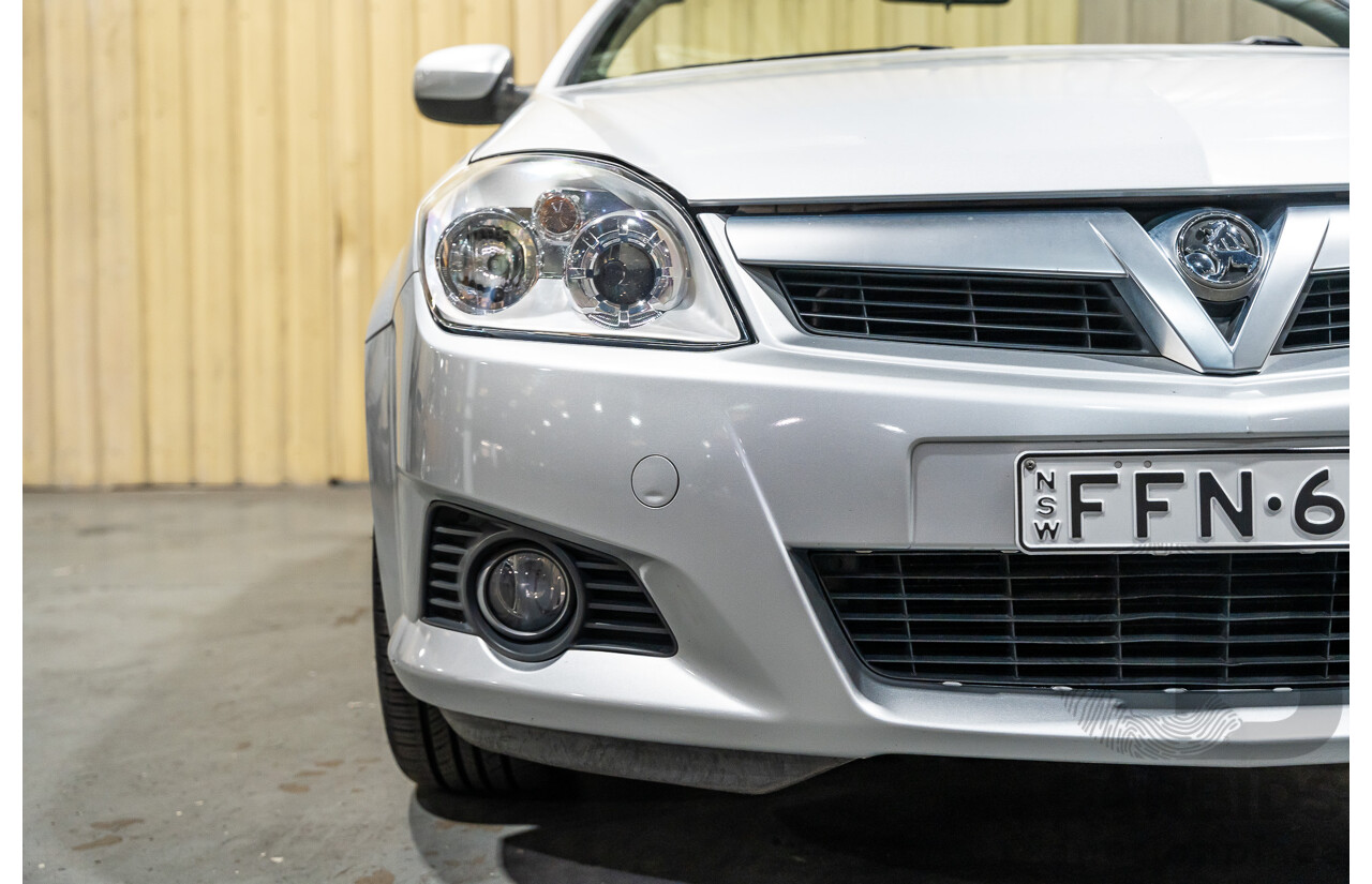 1/2006 Holden Tigra  XC MY06 2d Convertible Metallic Silver 1.8L