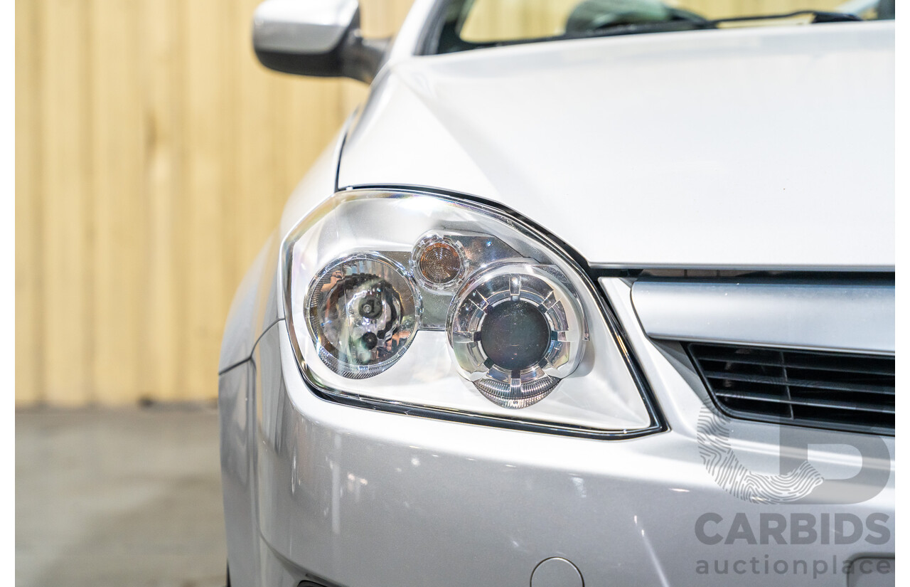 1/2006 Holden Tigra  XC MY06 2d Convertible Metallic Silver 1.8L