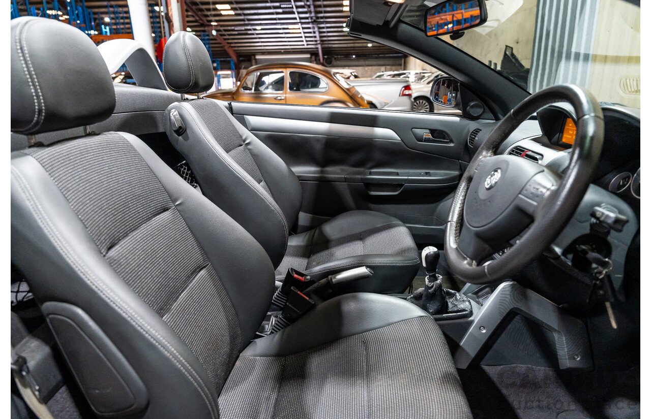 1/2006 Holden Tigra  XC MY06 2d Convertible Metallic Silver 1.8L