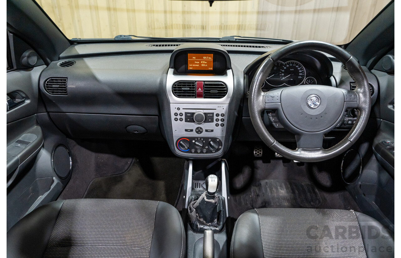 1/2006 Holden Tigra  XC MY06 2d Convertible Metallic Silver 1.8L