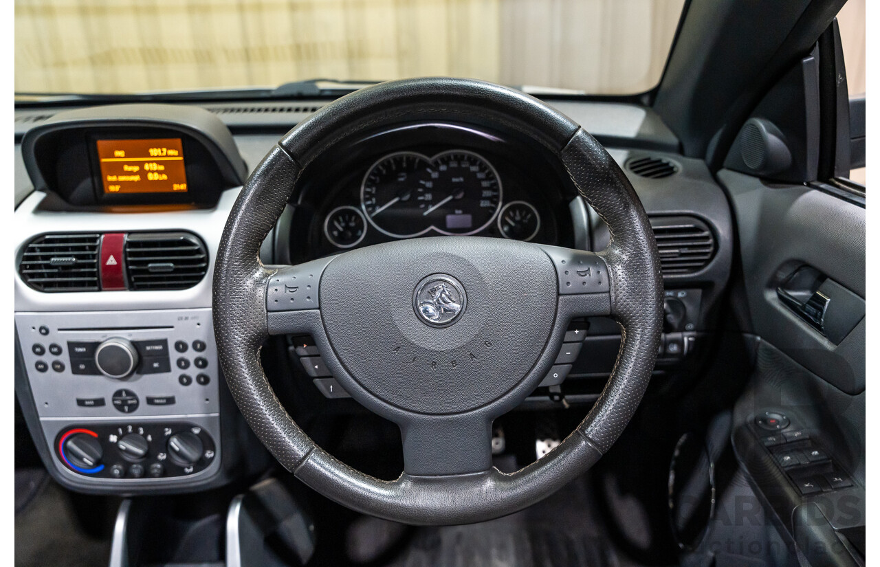 1/2006 Holden Tigra  XC MY06 2d Convertible Metallic Silver 1.8L