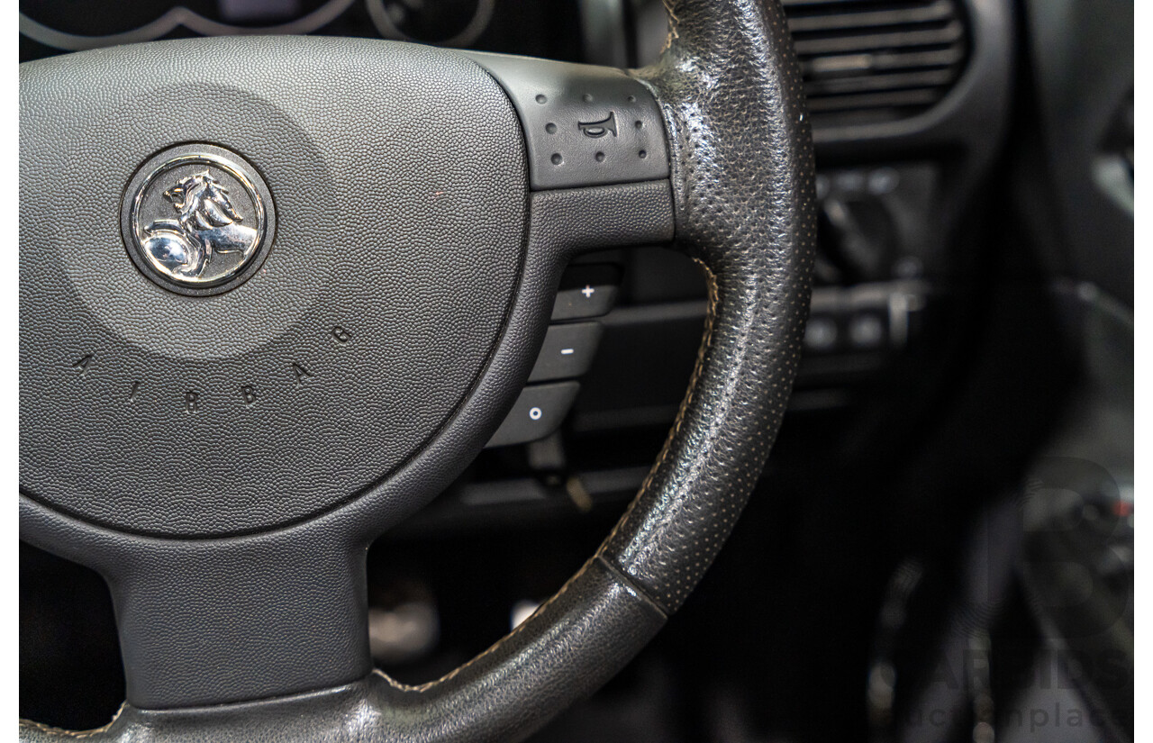 1/2006 Holden Tigra  XC MY06 2d Convertible Metallic Silver 1.8L