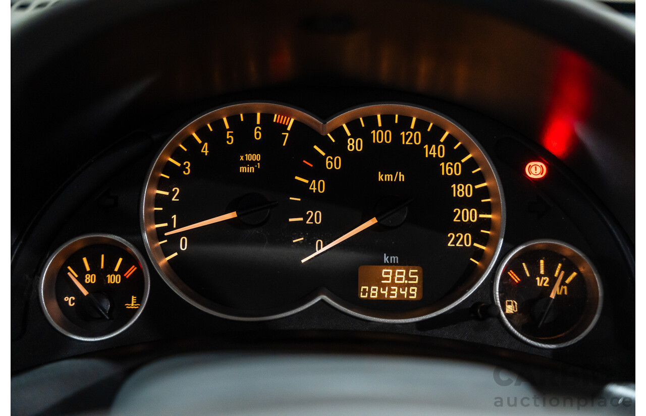 1/2006 Holden Tigra  XC MY06 2d Convertible Metallic Silver 1.8L