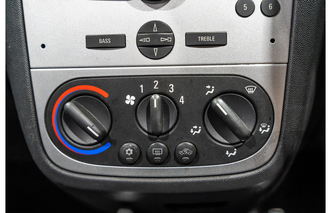 1/2006 Holden Tigra  XC MY06 2d Convertible Metallic Silver 1.8L