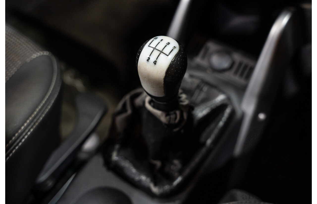 1/2006 Holden Tigra  XC MY06 2d Convertible Metallic Silver 1.8L