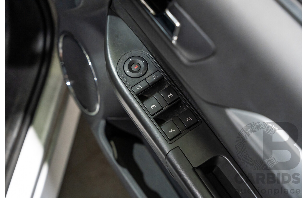 1/2006 Holden Tigra  XC MY06 2d Convertible Metallic Silver 1.8L