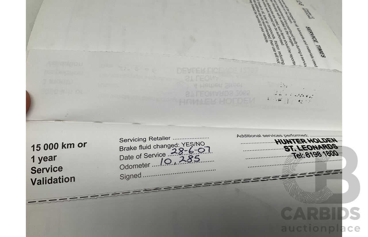 1/2006 Holden Tigra  XC MY06 2d Convertible Metallic Silver 1.8L