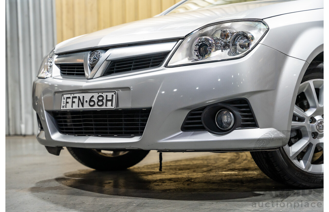 1/2006 Holden Tigra  XC MY06 2d Convertible Metallic Silver 1.8L