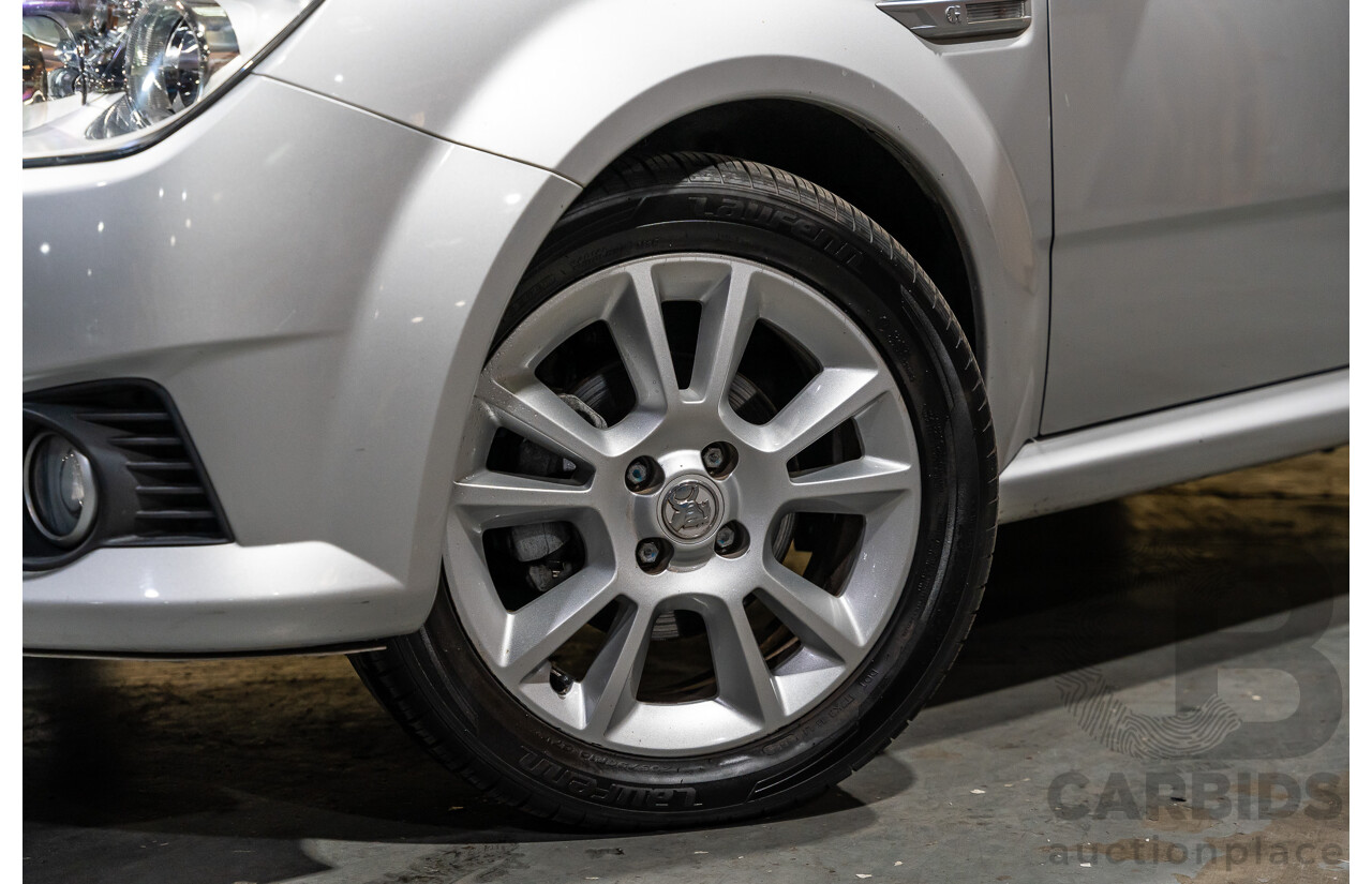 1/2006 Holden Tigra  XC MY06 2d Convertible Metallic Silver 1.8L