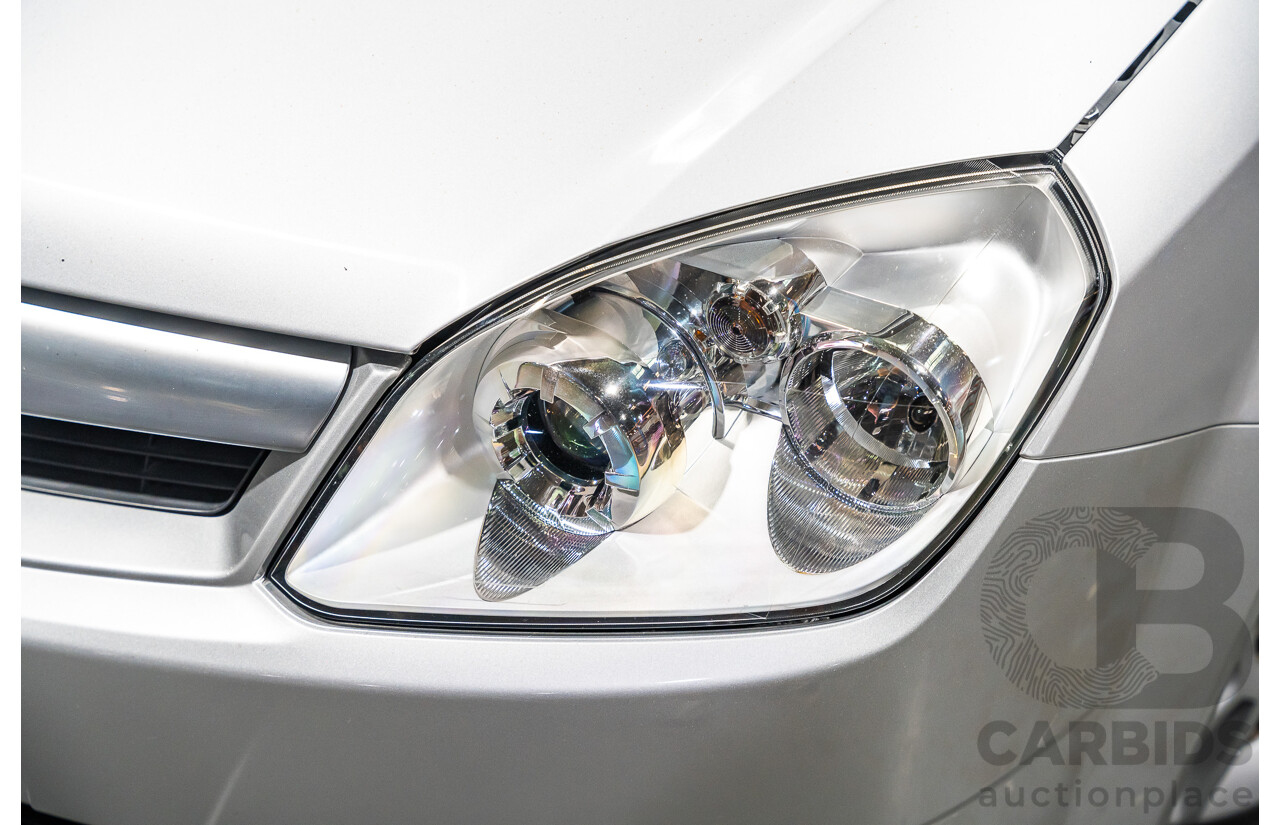 1/2006 Holden Tigra  XC MY06 2d Convertible Metallic Silver 1.8L