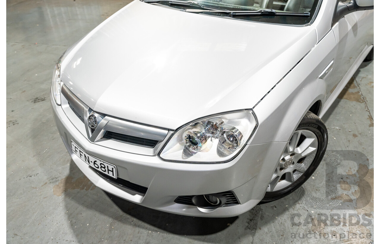 1/2006 Holden Tigra  XC MY06 2d Convertible Metallic Silver 1.8L