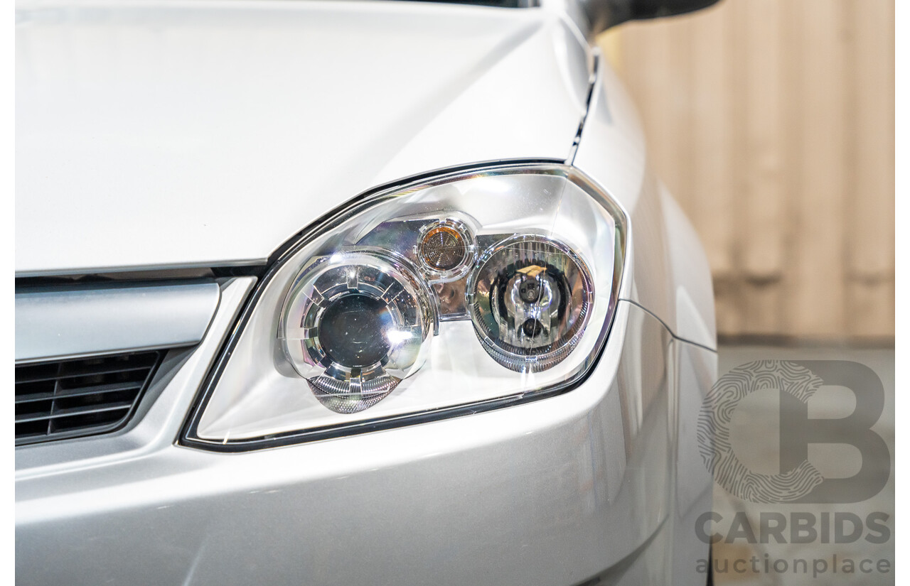 1/2006 Holden Tigra  XC MY06 2d Convertible Metallic Silver 1.8L