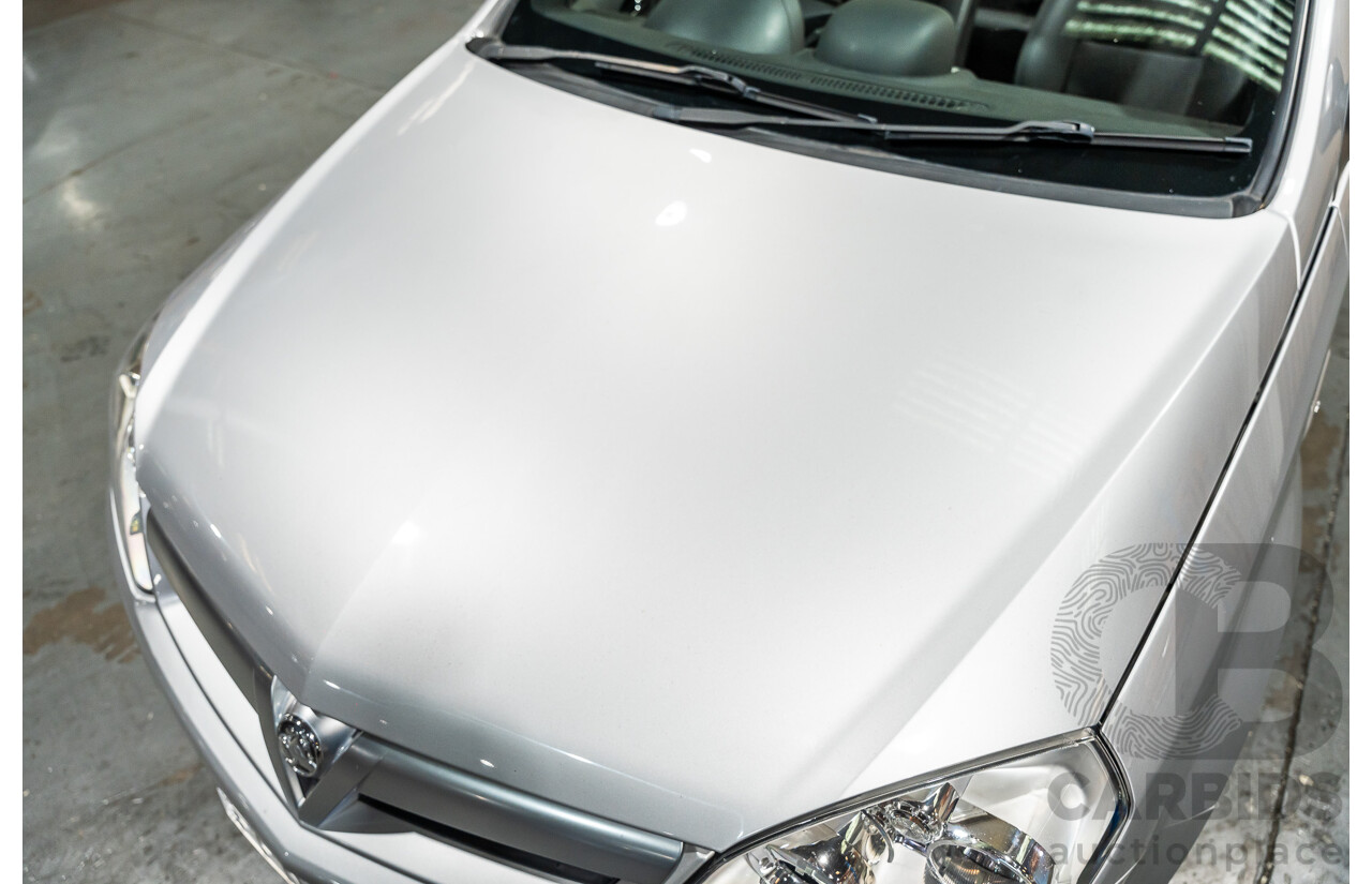 1/2006 Holden Tigra  XC MY06 2d Convertible Metallic Silver 1.8L