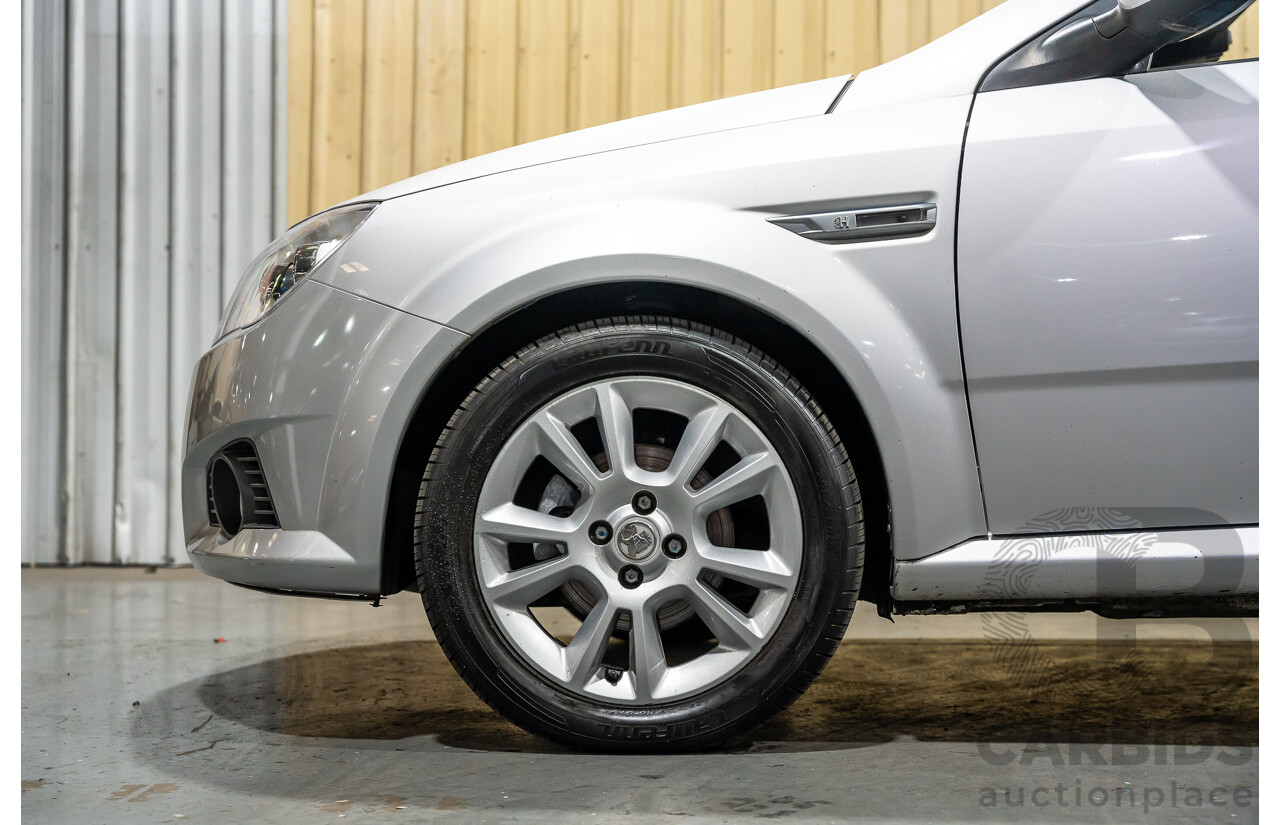 1/2006 Holden Tigra  XC MY06 2d Convertible Metallic Silver 1.8L