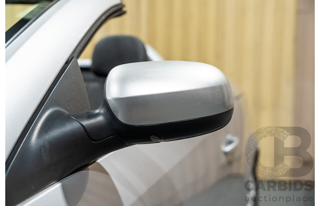 1/2006 Holden Tigra  XC MY06 2d Convertible Metallic Silver 1.8L