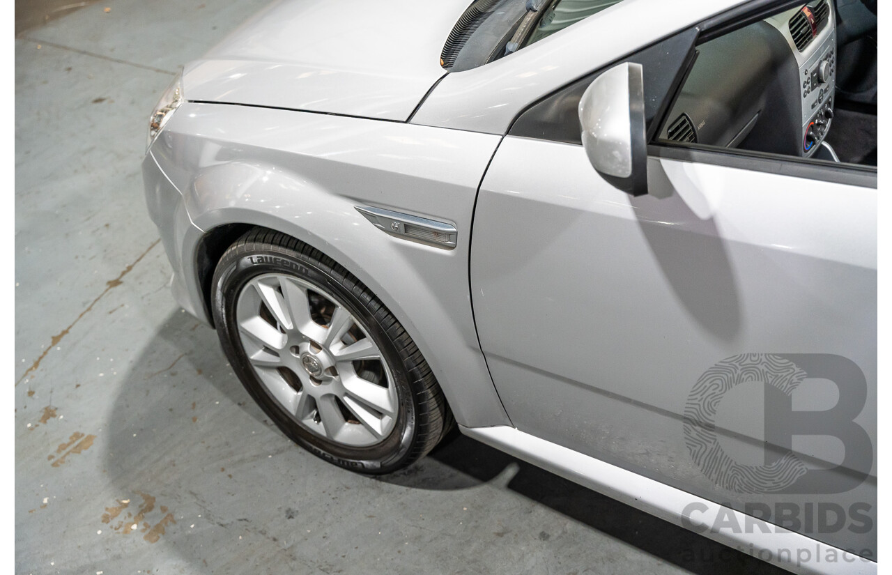 1/2006 Holden Tigra  XC MY06 2d Convertible Metallic Silver 1.8L