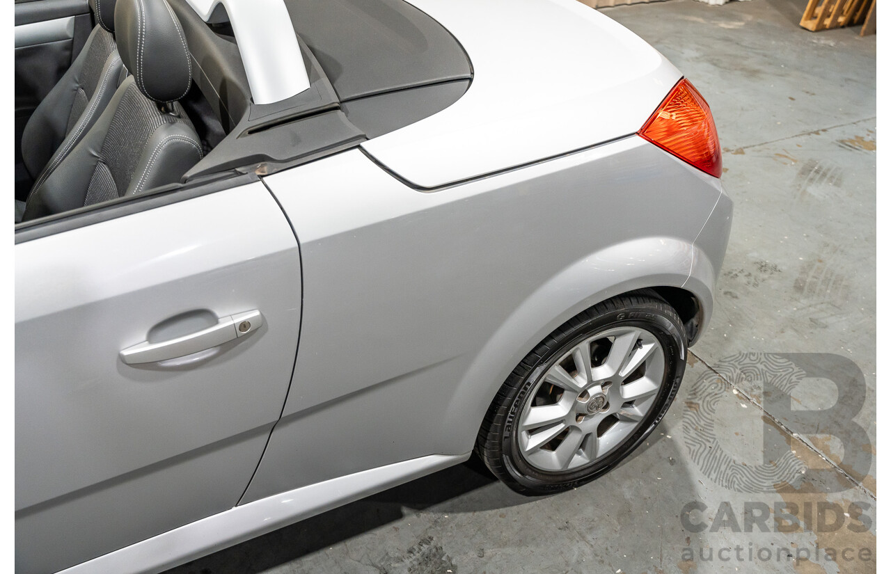 1/2006 Holden Tigra  XC MY06 2d Convertible Metallic Silver 1.8L