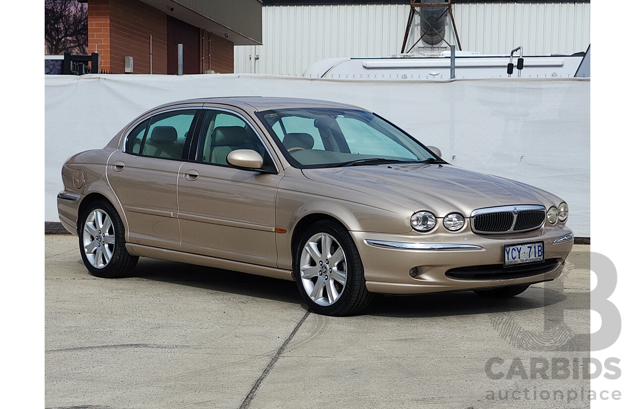 11/2003 Jaguar X Type SE AWD  4D Sedan Gold 3.0L