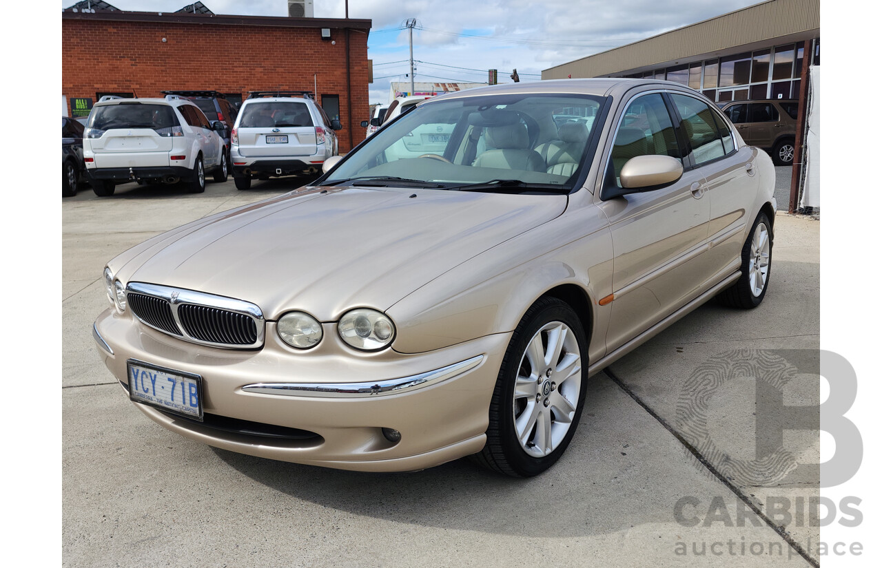 11/2003 Jaguar X Type SE AWD  4D Sedan Gold 3.0L