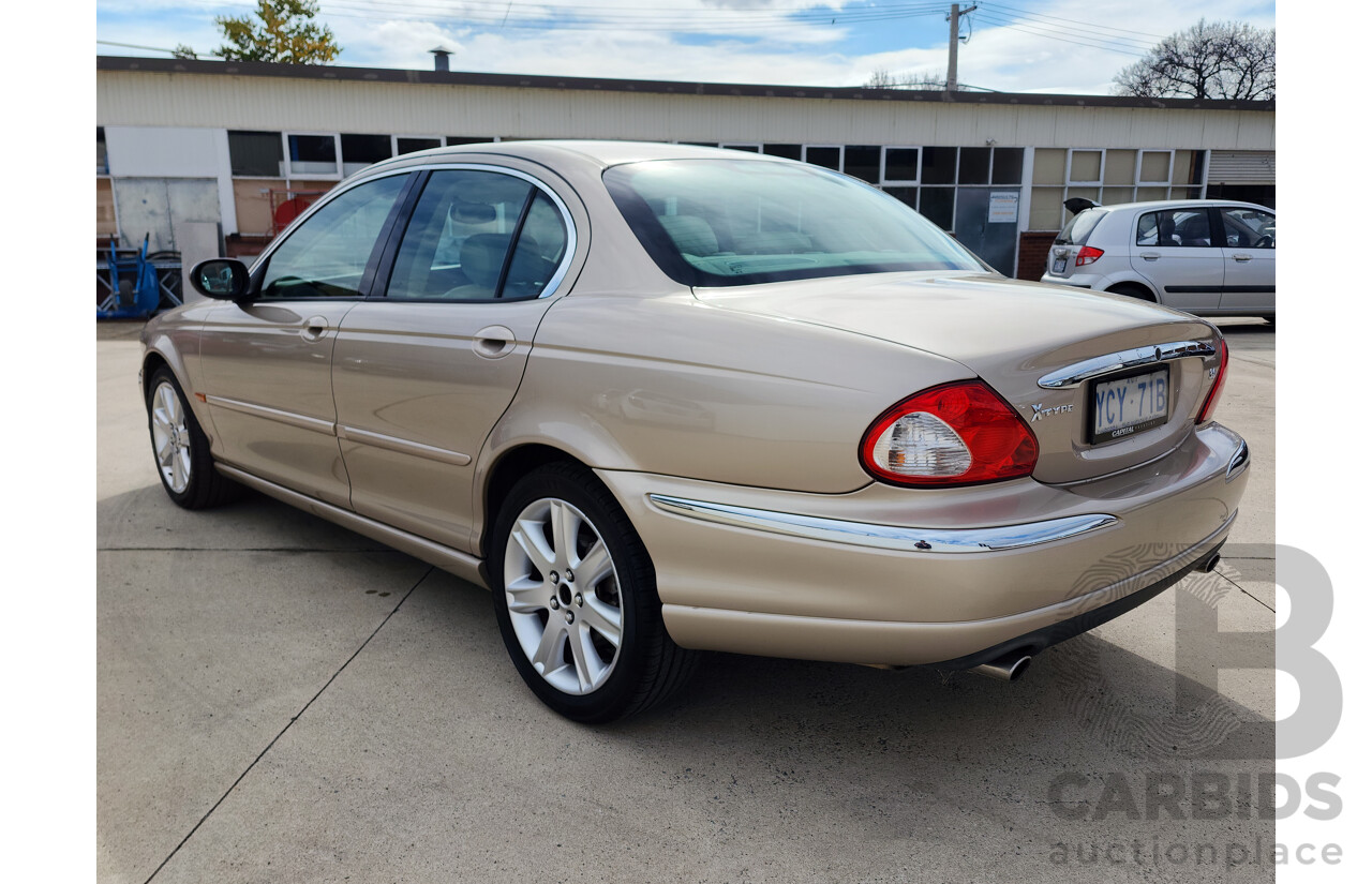 11/2003 Jaguar X Type SE AWD  4D Sedan Gold 3.0L