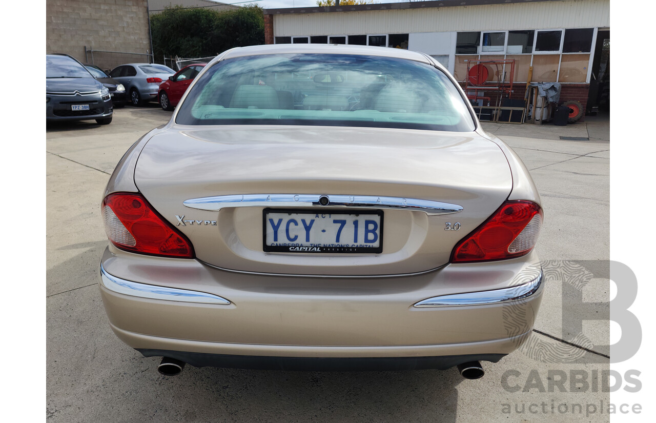 11/2003 Jaguar X Type SE AWD  4D Sedan Gold 3.0L