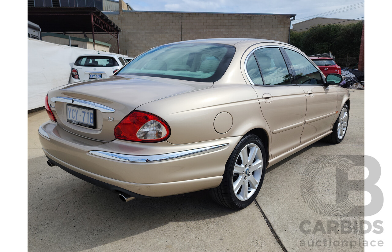 11/2003 Jaguar X Type SE AWD  4D Sedan Gold 3.0L
