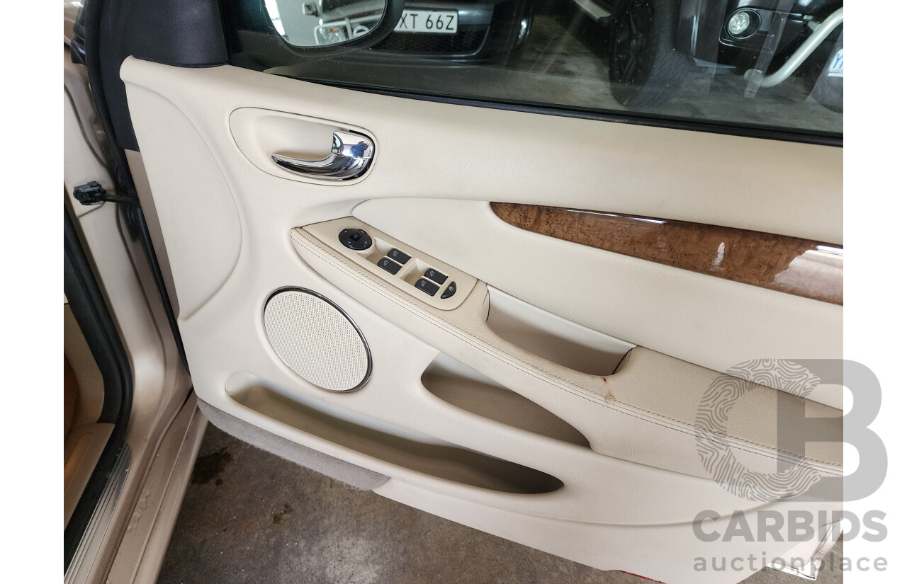 11/2003 Jaguar X Type SE AWD  4D Sedan Gold 3.0L