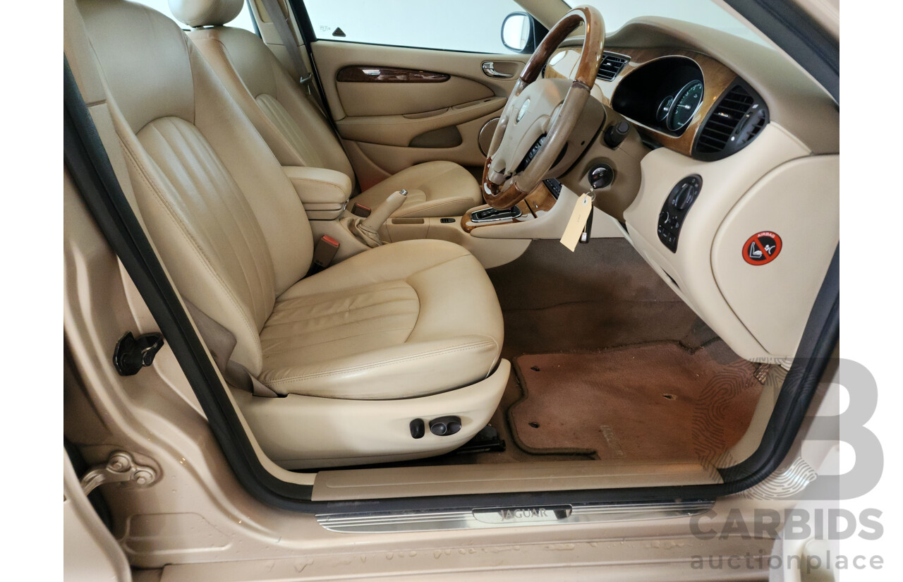 11/2003 Jaguar X Type SE AWD  4D Sedan Gold 3.0L