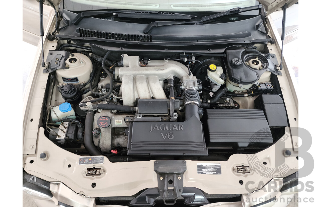 11/2003 Jaguar X Type SE AWD  4D Sedan Gold 3.0L