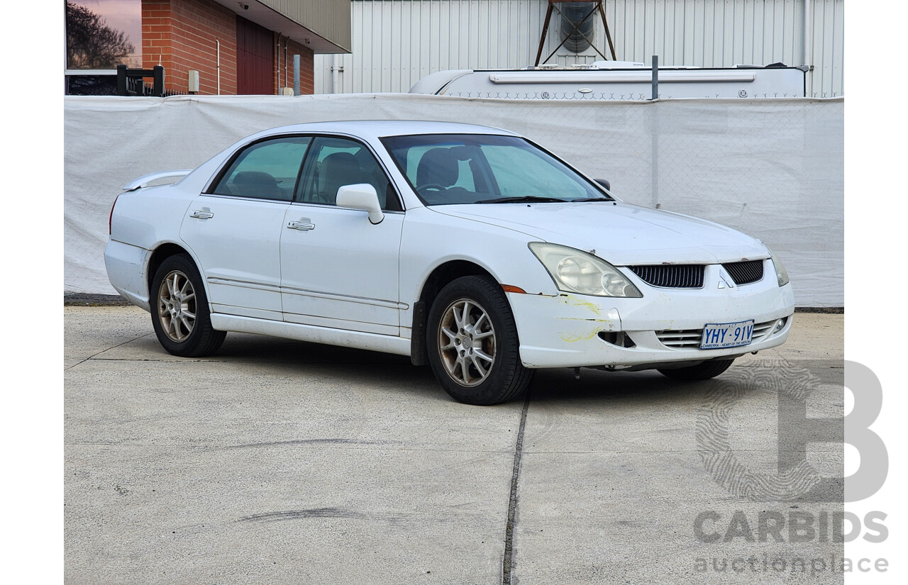 03/2004 Mitsubishi Verada Ei FWD KL 4D Sedan White 3.5L