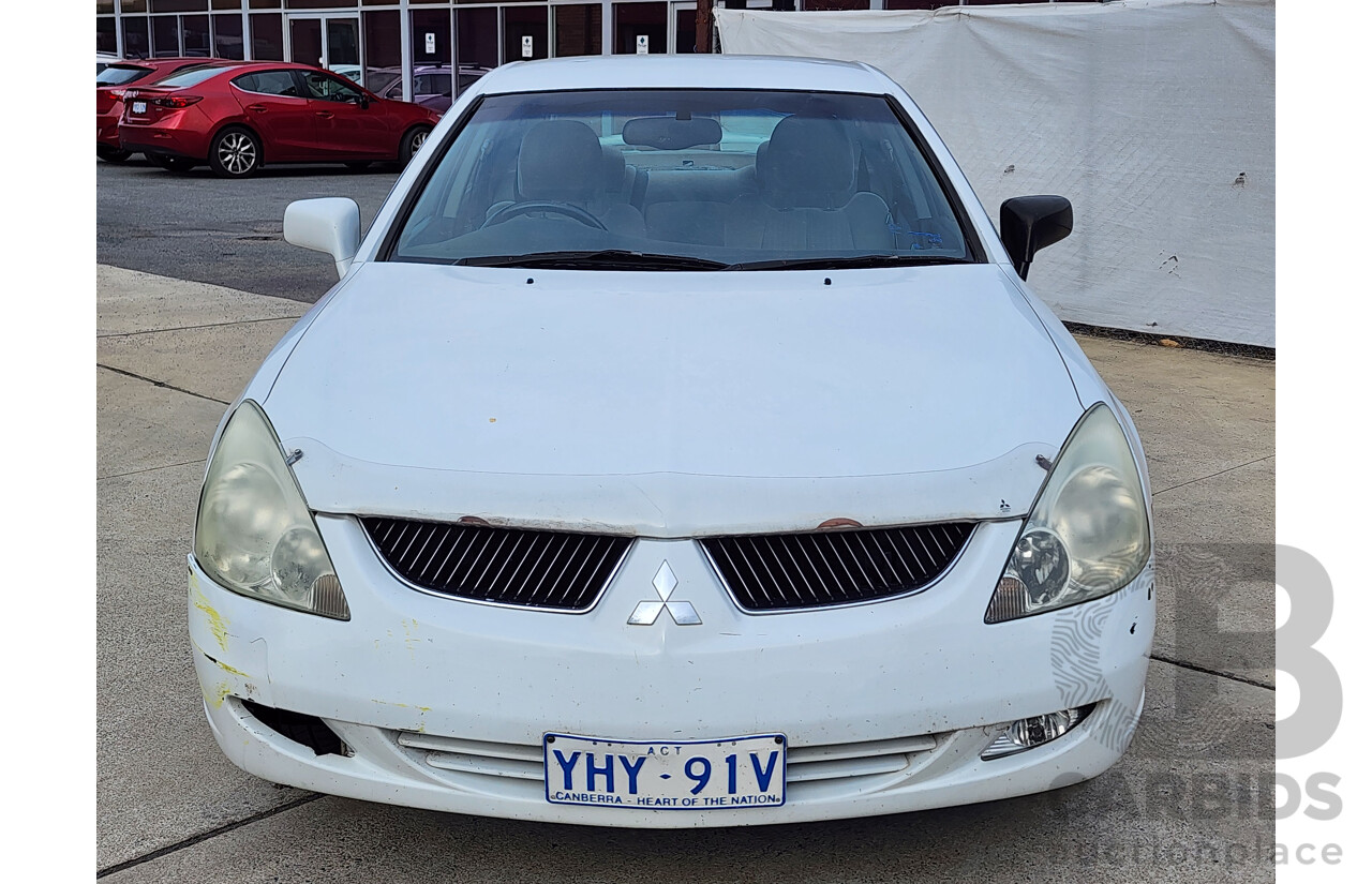 03/2004 Mitsubishi Verada Ei FWD KL 4D Sedan White 3.5L