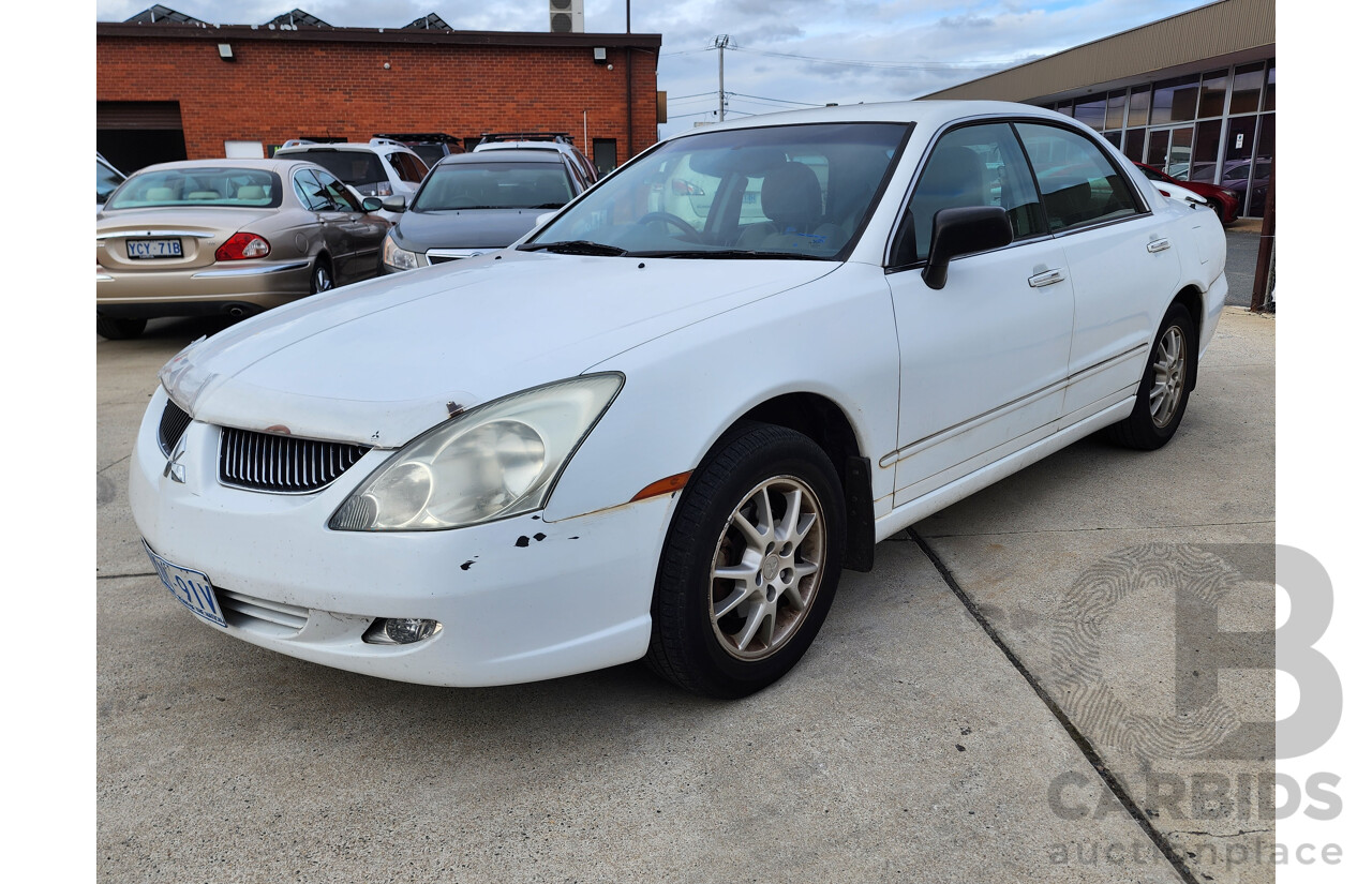 03/2004 Mitsubishi Verada Ei FWD KL 4D Sedan White 3.5L