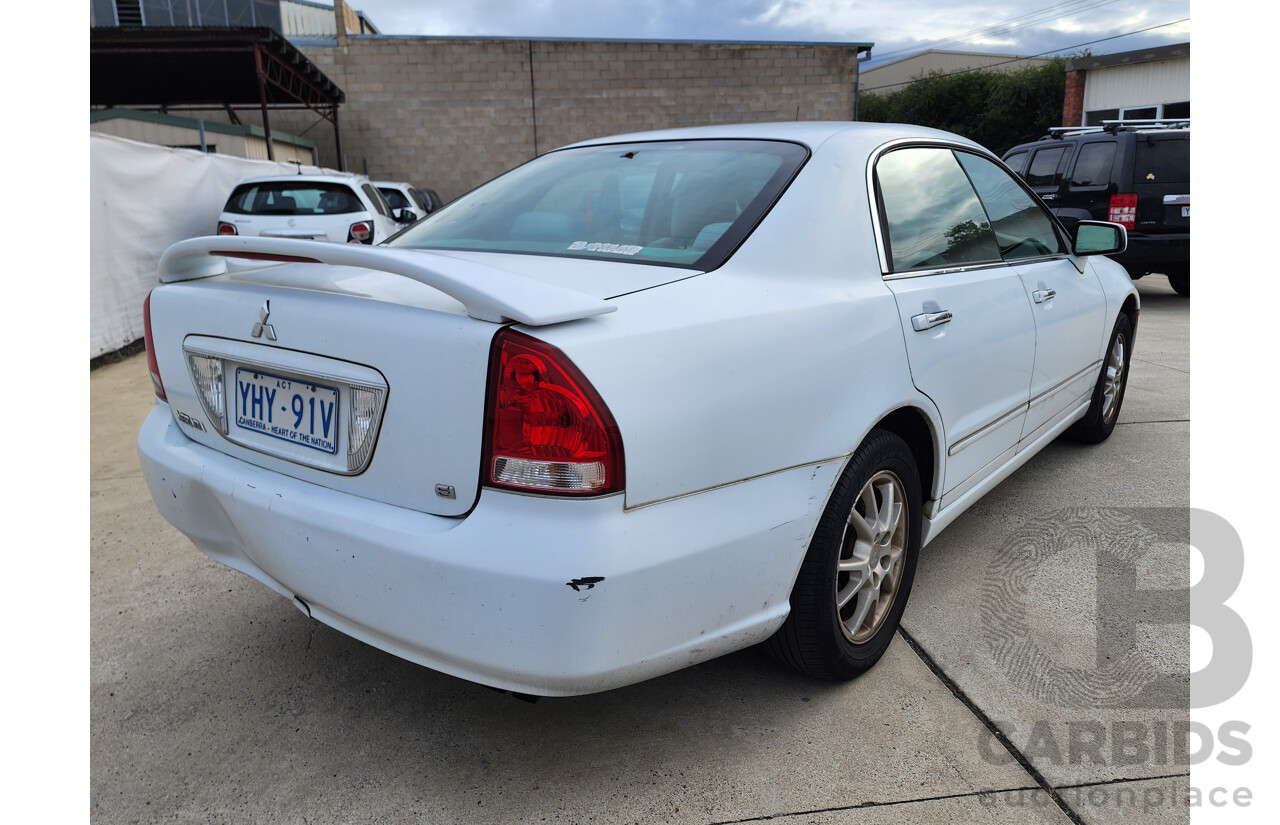 03/2004 Mitsubishi Verada Ei FWD KL 4D Sedan White 3.5L