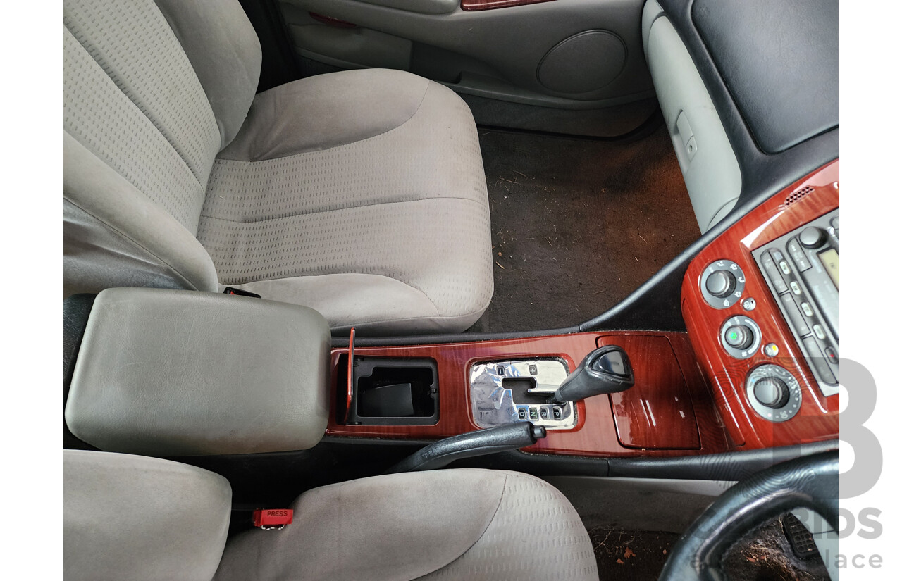 03/2004 Mitsubishi Verada Ei FWD KL 4D Sedan White 3.5L