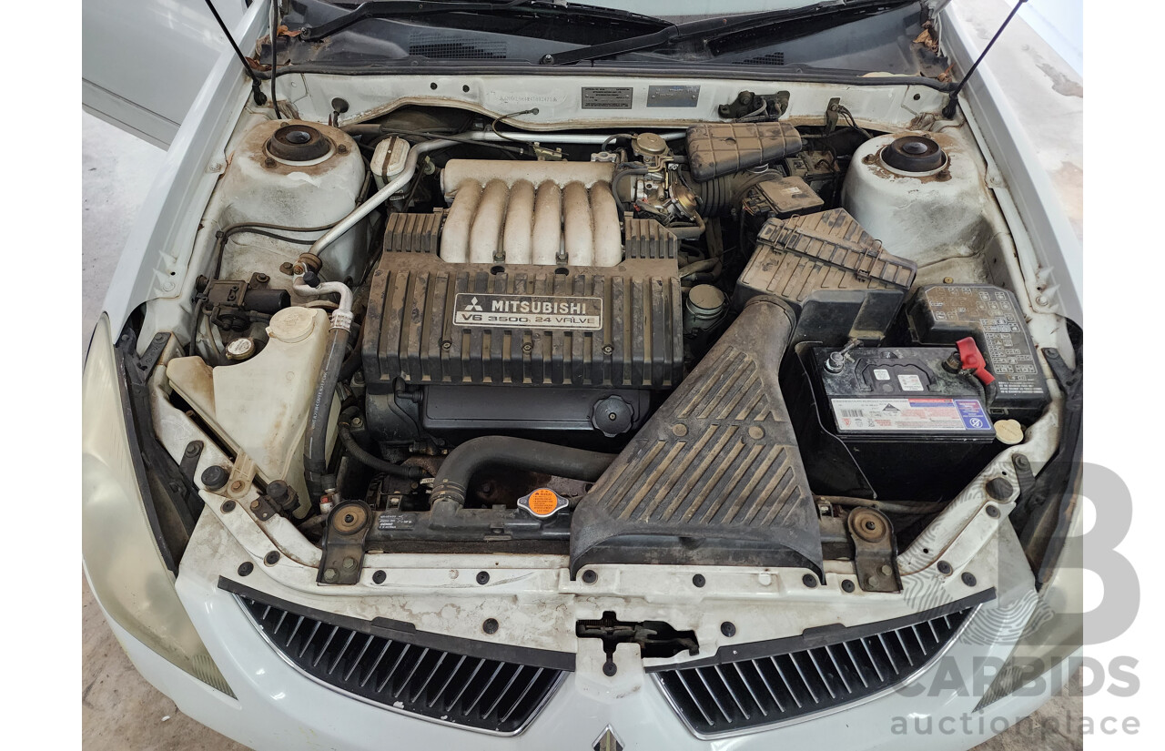 03/2004 Mitsubishi Verada Ei FWD KL 4D Sedan White 3.5L
