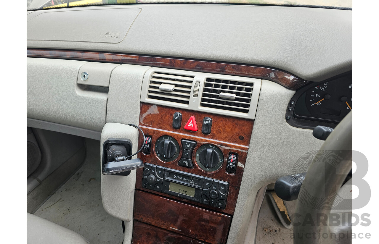 4/2002 Mercedes-Benz E270 CDI Elegance W210 4d Sedan Beige 2.7L