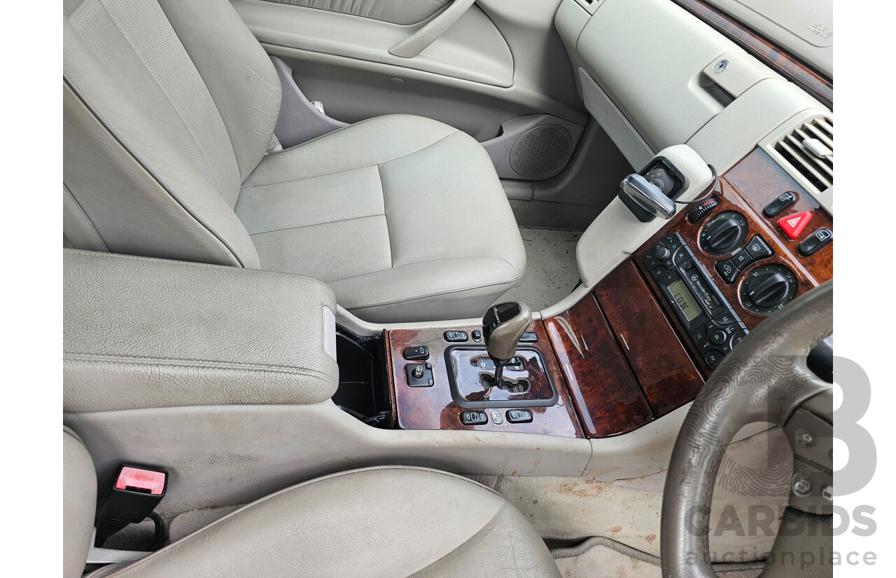 4/2002 Mercedes-Benz E270 CDI Elegance W210 4d Sedan Beige 2.7L