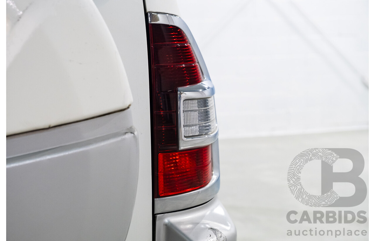 9/2002 Mitsubishi Pajero Exceed LWB (4x4) NM 4d Wagon White V6 3.5L - 7 Seater