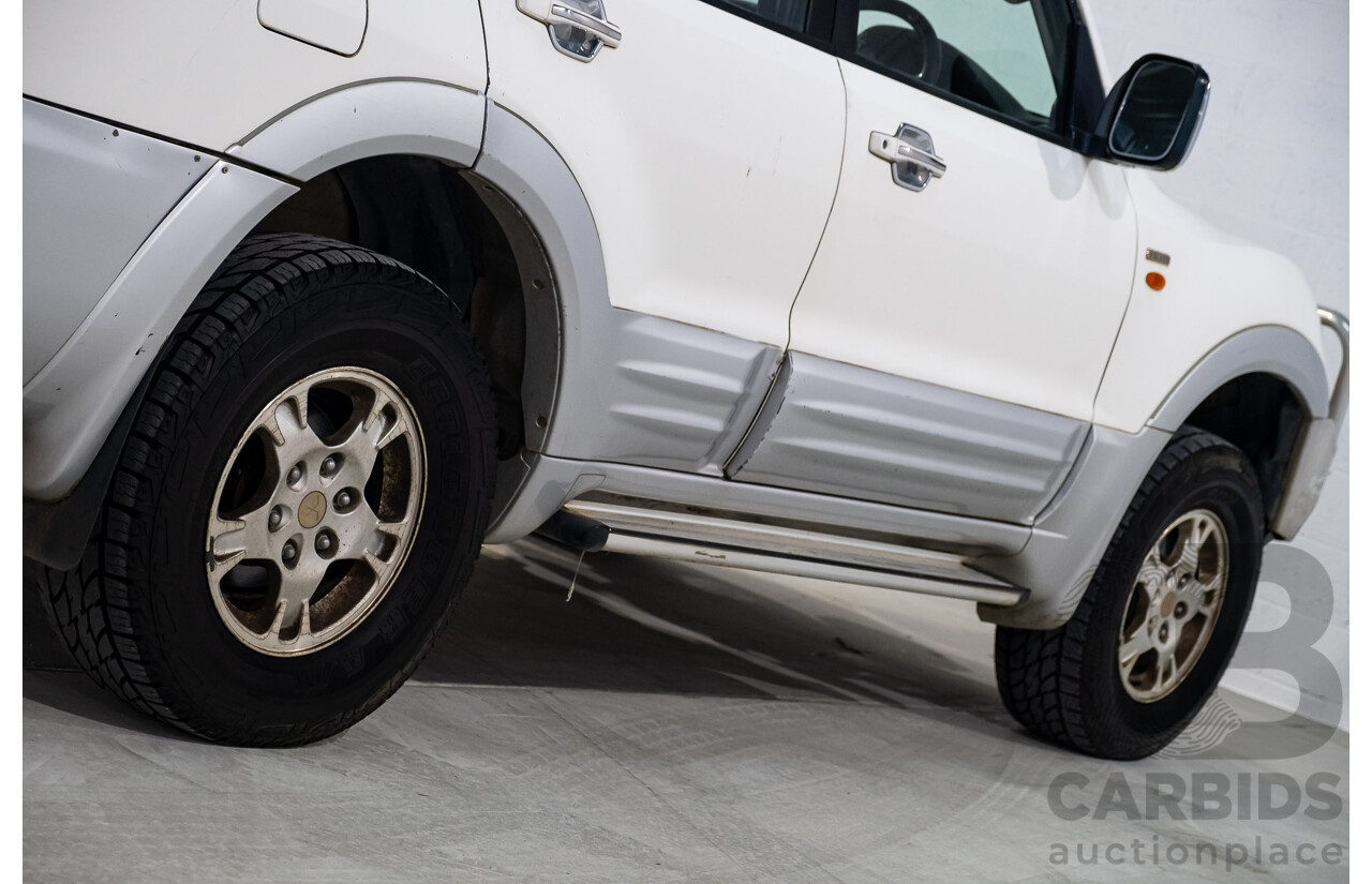 9/2002 Mitsubishi Pajero Exceed LWB (4x4) NM 4d Wagon White V6 3.5L - 7 Seater