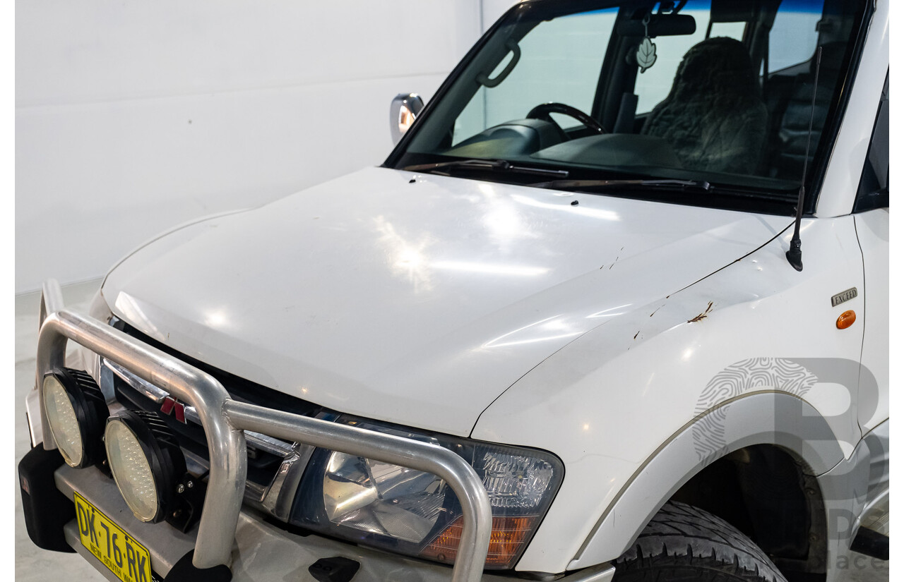 9/2002 Mitsubishi Pajero Exceed LWB (4x4) NM 4d Wagon White V6 3.5L - 7 Seater